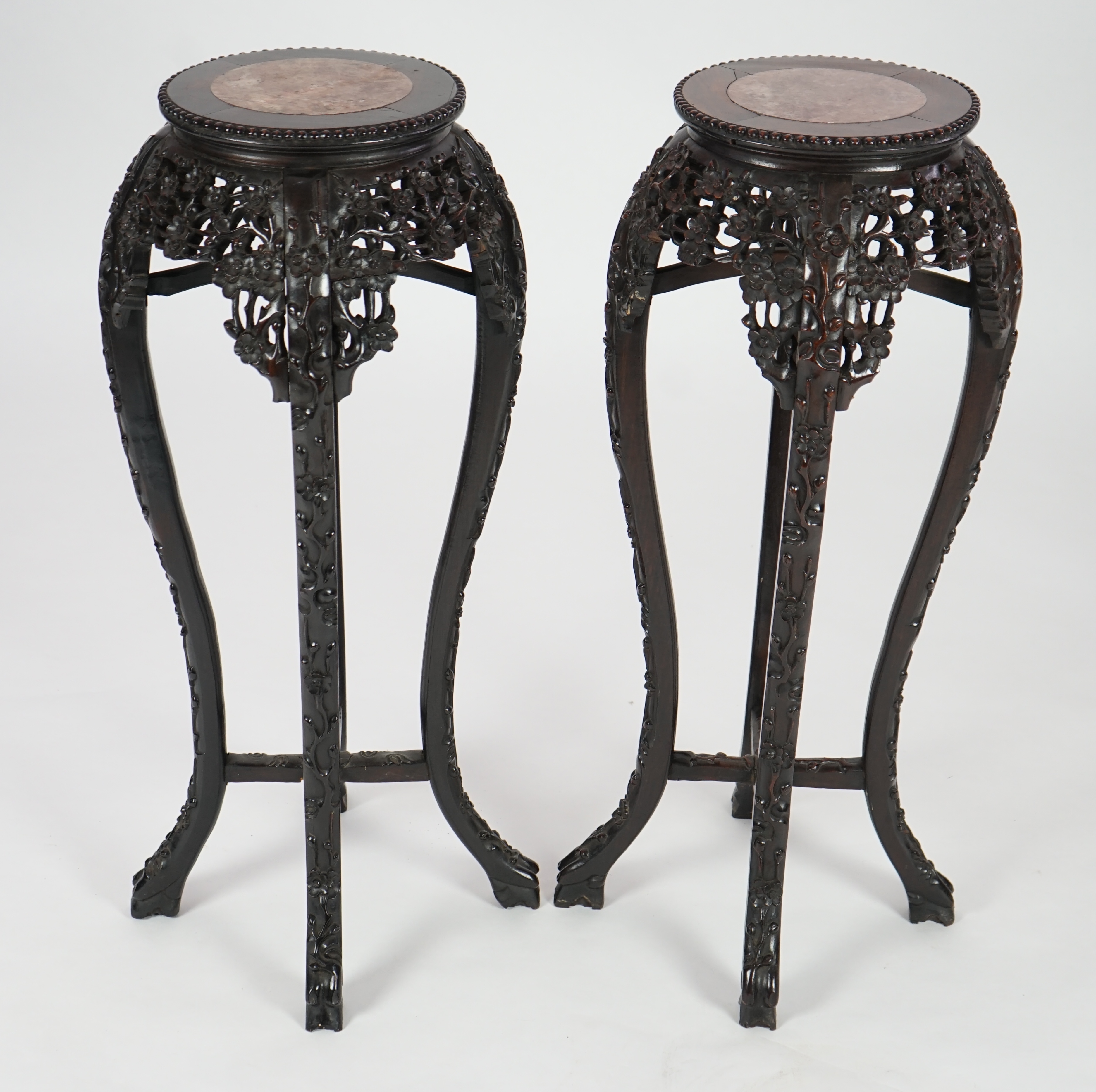 A pair of late 19th century Chinese hongmu and marble inset vase stands, height 91cm. Condition - fair to good